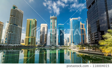 Residential buildings in Jumeirah Lake Towers timelapse hyperlapse in Dubai, UAE. 118004015