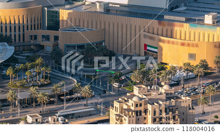 Top view of mall entrance and parking area timelapse. Top view of mall entrance and parking area timelapse. 118004016