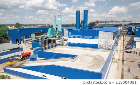 The territory of a cement plant for the production of building materials aerial timelapse. 118004081