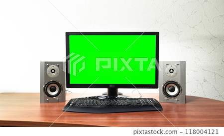 Computer green screen monitor is standing on a desk in an office timelapse hyperlapse. 118004121