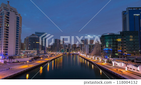 Dubai Marina towers and canal in Dubai night to day timelapse 118004132