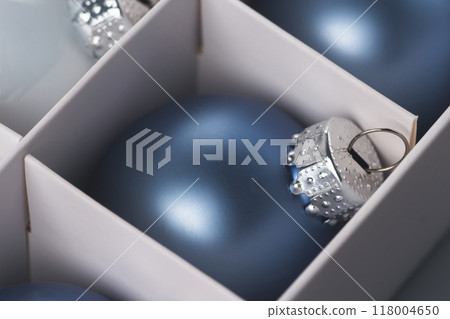 blue Christmas ball in a box. Christmas concept. High quality photo blue Christmas ball in a box. Christmas concept. High quality photo 118004650