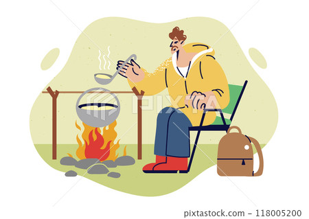 Camping and cooking by male traveler going on solo trek into wild for thrill or challenge 118005200