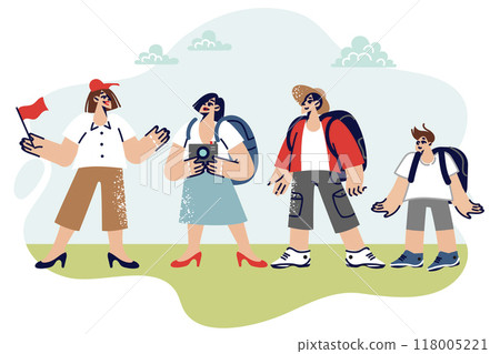 Woman guide conducts tour for family, showing sights and telling interesting historical facts 118005221