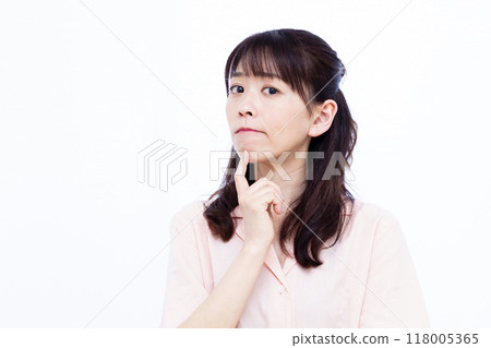 A woman who is seriously worried A woman who is seriously worried 118005365