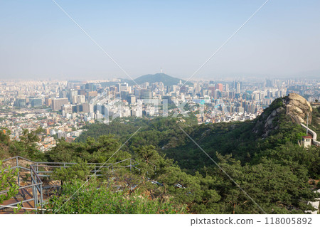 Seoul cityscape in the afternoon and Dongdaemun skyscrapers with Namsan Mountain in the background, Seoul, South Korea. 118005892