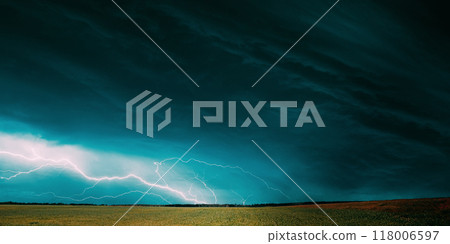 Countryside Rural Wheat Field Meadow Landscape In Summer Rainy Day. Scenic Sky With Rain Clouds On Horizon. Countryside Rural Wheat Field Meadow Landscape In Summer Rainy Day. Scenic Sky With Rain Clouds On Horizon. 118006597
