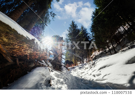 Amazing tourist trail along the winter Bear Gorge in the Almaty region of Kazakhstan. Amazing mountains landscapes of Central Asia. Amazing tourist trail along the winter Bear Gorge in the Almaty region of Kazakhstan. Amazing mountains landscapes of Central Asia. 118007538