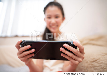 Hands of children playing games Hands of children playing games 118008327