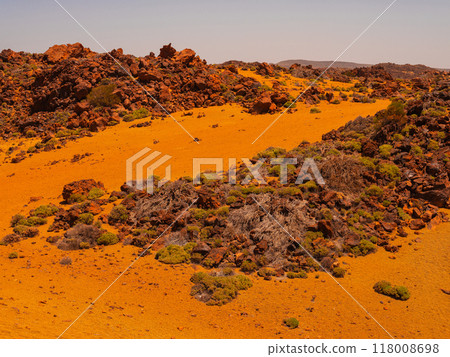 spot in Tenerife with many red rocks and beautiful mountain landscape background 118008698