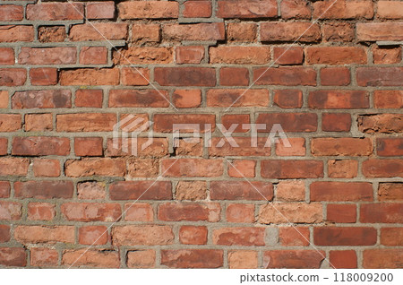 Background texture. Old damaged brick wall. 118009200