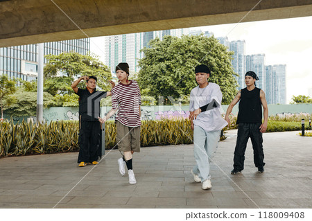 Dancing Under Urban Overpass With Group of Friends 118009408