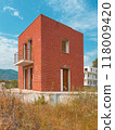 Unfinished residential building at abandoned construction site 118009420