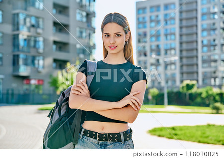 Outdoor portrait young teenager student female with backpack Outdoor portrait young teenager student female with backpack 118010025