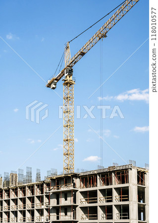 Construction industry building. Construction industry site with cranes, fittings and concrete. Construction industry building. Construction industry site with cranes, fittings and concrete. 118010577