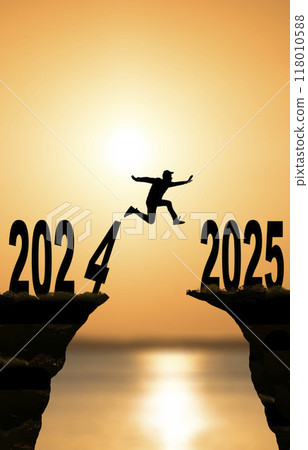 2025 year concept. Silhouettes of active people in nature against the backdrop of sunset and the numbers 2025 2025 year concept. Silhouettes of active people in nature against the backdrop of sunset and the numbers 2025 118010588
