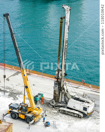 Installation of pile casings in the port quay, drilling rig, port infrastructure upgrade works 118010642