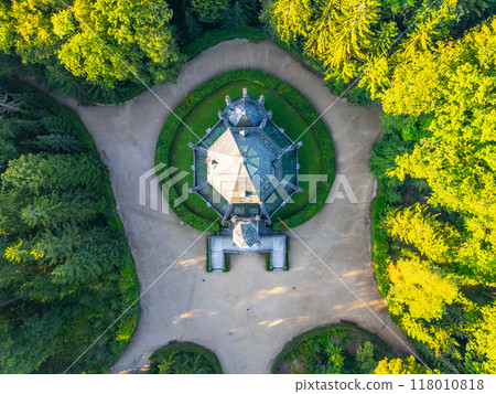 The intricate architecture of the Schwarzenberg Tomb in Domanin, surrounded by lush greenery, showcases historical significance amidst the tranquil landscape of Czechia. Aerial view from above 118010818