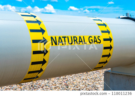 A huge diameter gas pipeline with a gas transportation direction indicator and the inscription Natural Gas 118011236