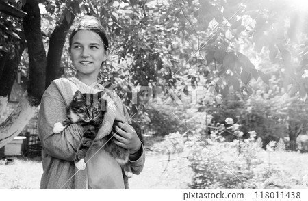 Young girl with cute cat 118011438