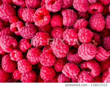 Fresh raspberries as a background. Organic Raspberries at the Farmer's Market 118011513