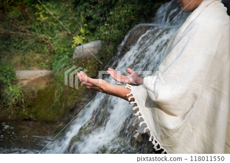 Praying man at the river Praying man at the river 118011550