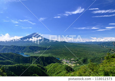 A spectacular summer mountain view: Mt. Fuji and the blue sky from the Misaka Mountains A spectacular summer mountain view: Mt. Fuji and the blue sky from the Misaka Mountains 118012373