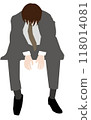 A depressed businessman sitting down 118014081