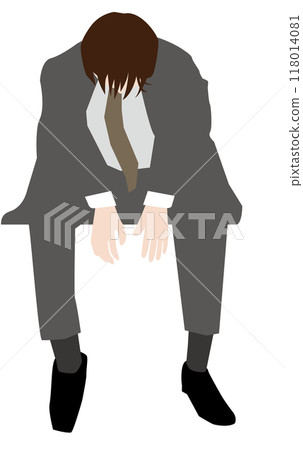 A depressed businessman sitting down 118014081