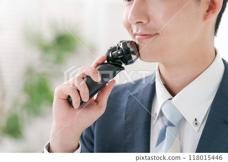 Salaryman shaving his beard Salaryman shaving his beard 118015446