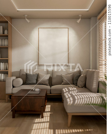 A large blank frame mockup on a white wall, illuminated by ceiling spot lights in a living room. A large blank frame mockup on a white wall, illuminated by ceiling spot lights in a living room. 118015596