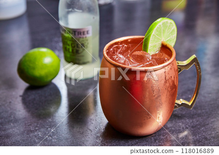 Chilled Moscow Mule in Copper Mug with Lime Slice Chilled Moscow Mule in Copper Mug with Lime Slice 118016889