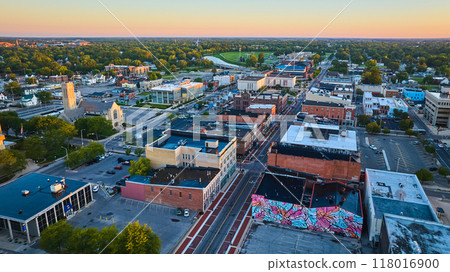 Colorful mural on building wall on S Walnut St with city aerial, Muncie, Indiana at dawn Colorful mural on building wall on S Walnut St with city aerial, Muncie, Indiana at dawn 118016900