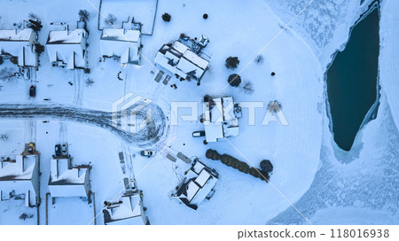 Aerial Winter Village by Frozen Lake at Blue Hour 118016938