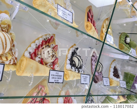 Assorted Gourmet Crepes in Glass Display Case at Eye Level Assorted Gourmet Crepes in Glass Display Case at Eye Level 118017082