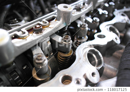 Close up of hydraulic valve internal in engine of the car to adjust the ignition 118017125