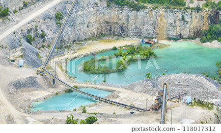 Aerial View of Industrial Quarry with Turquoise Water and Conveyor Belts Aerial View of Industrial Quarry with Turquoise Water and Conveyor Belts 118017312