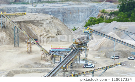 Aerial Fly Through Industrial Quarry with Conveyor Belts and Heavy Machinery Aerial Fly Through Industrial Quarry with Conveyor Belts and Heavy Machinery 118017324