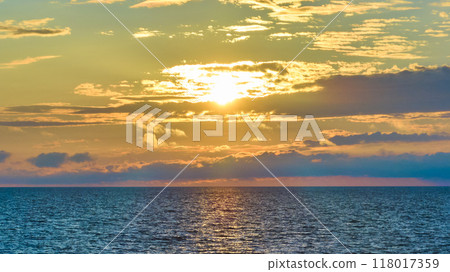 Aerial Sunset Over Tranquil Lake Michigan during Golden Hour Aerial Sunset Over Tranquil Lake Michigan during Golden Hour 118017359