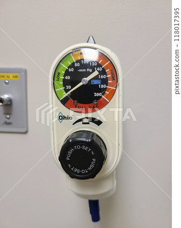 Medical Vacuum Regulator and Air Outlet in Clinical Setting Eye Level Perspective Medical Vacuum Regulator and Air Outlet in Clinical Setting Eye Level Perspective 118017395