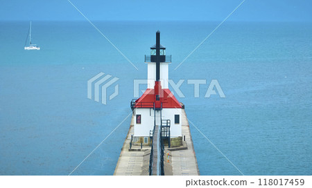 Aerial View of St. Joseph North Pier Lighthouse and Sailboat on Lake Michigan Aerial View of St. Joseph North Pier Lighthouse and Sailboat on Lake Michigan 118017459
