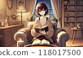 一個女人晚上坐在椅子上看書 118017500