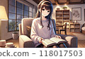 一個女人晚上坐在椅子上看書 118017503