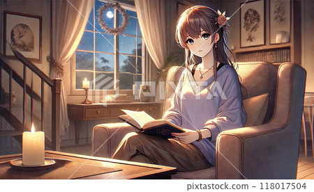 一個女人晚上坐在椅子上看書 118017504