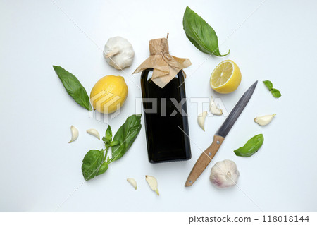 The concept of Italian cuisine, olive oil, on a light background. 118018144