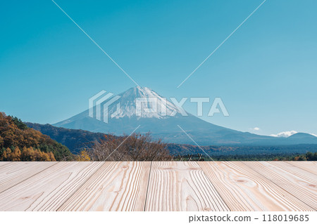 Empty wood table mockup with Mount Fuji view at Saiko Iyashino Sato Nenba background and copy space for text, Mock up for your product display and montage in autumn season. Japan travel and vacation Empty wood table mockup with Mount Fuji view at Saiko Iyashino Sato Nenba background and copy space for text, Mock up for your product display and montage in autumn season. Japan travel and vacation 118019685