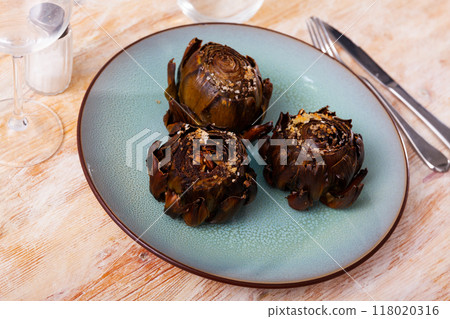 Appetizing dish of artichokes 118020316
