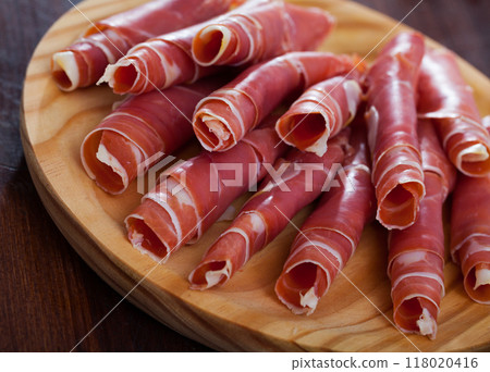 Rolled up slices of dry-cured ham Rolled up slices of dry-cured ham 118020416