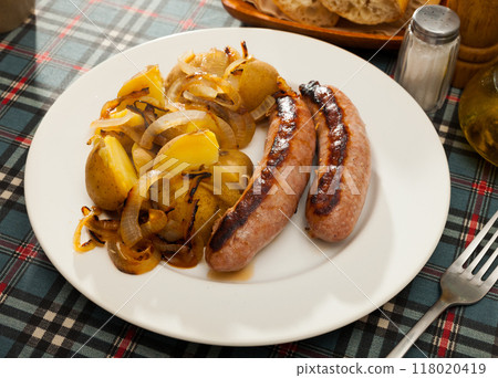 Grilled sausages with potatoes Grilled sausages with potatoes 118020419