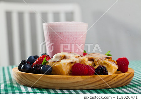 Cinnabons with berry smoothie 118020471